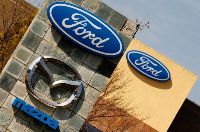 The logos of Ford and Mazda Motor Co are seen at the company's assembly plant in Pretoria