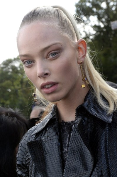 Bielorussian model Tanya Dziahileva poses prior to the start of the Louis Vuitton 2016 Spring/Summer ready-to-wear collection fashion show, on October 7, 2015 in Paris. AFP PHOTO / MIGUEL MEDINA