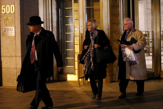 Attorneys Rebekah J. Poston (C) and John J. Reilly (R) leave U.S. District Court in the Manhattan borough of New York City, November 12, 2015. Poston and Reilly are representing Efrain Antonio Campo Flores, 29, one of two of Venezuelan President Nicolas Maduro's relatives who have been indicted in the United States for cocaine smuggling, following an international sting that Venezuela cast as an "imperialist" attack. REUTERS/Mike Segar