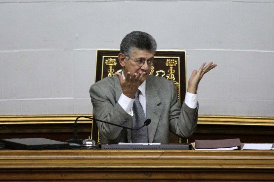 Henry Ramos Allup (C), president of the National Assembly and deputy of the Venezuelan coalition of opposition parties (MUD), gestures during a session of the National Assembly in Caracas January 22, 2016. Venezuela's opposition refused on Friday to approve President Nicolas Maduro's "economic emergency" decree in Congress, saying it offered no solutions for the OPEC nation's increasingly disastrous recession. Underlining the grave situation in Venezuela, where a plunge in oil prices has compounded dysfunctional policies, the International Monetary Fund on Friday forecast an 8 percent drop in gross domestic product and 720 percent inflation this year. REUTERS/Marco Bello