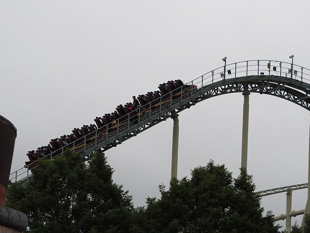 This is the moment passengers were evacuated from a Thorpe Park rollercoaster carriage yesterday (Sun) after it ground to a halt mid-ride. People were escorted from Colossus after staff spotted one rider putting their leg outside of the cart on CCTV at around 11am. The clip shows some guests being escorted down the stairs at the side of the track while others remain seated. Henry Moody, 14, who was visiting the park, in Chertsey, Surrey, with his family said the passengers were near the top of the 100ft ride