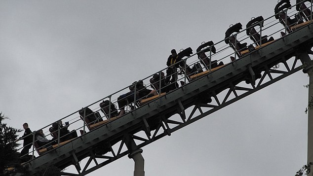 This is the moment passengers were evacuated from a Thorpe Park rollercoaster carriage yesterday (Sun) after it ground to a halt mid-ride. People were escorted from Colossus after staff spotted one rider putting their leg outside of the cart on CCTV at around 11am. The clip shows some guests being escorted down the stairs at the side of the track while others remain seated. Henry Moody, 14, who was visiting the park, in Chertsey, Surrey, with his family said the passengers were near the top of the 100ft ride