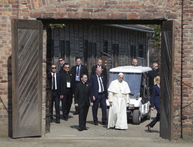 Pope Francis enters block 11 in the former Nazi German concentration and extermination camp Auschwitz-Birkenau in Oswiecim, Poland, July 29, 2016. REUTERS/David W Cerny