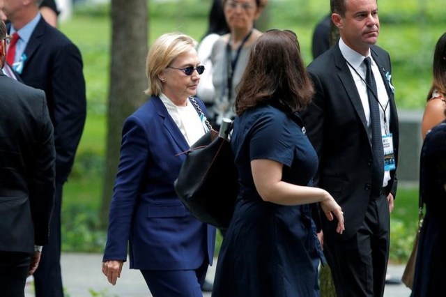 U.S. Democratic presidential candidate Hillary Clinton arrives for ceremonies to mark the 15th anniversary of the September 11 attacks at the National 9/11 Memorial in New York, New York, United States September 11, 2016.  REUTERS/Brian Snyder