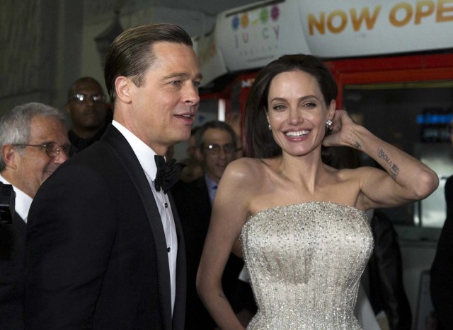 Director and cast member Angelina Jolie and her husband and co-star Brad Pitt arrive at the premiere of "By the Sea" during the opening night of AFI FEST 2015 in Hollywood, California, U.S. on November 5, 2015. REUTERS/Mario Anzuoni/File Photo