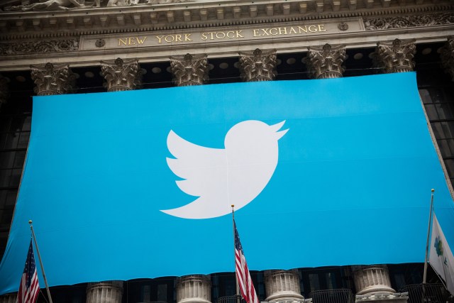 (FILES) This file photo taken on November 6, 2013 shows the Twitter logo displayed on a banner outside the New York Stock Exchange (NYSE) in New York. US stocks rose early October 5, 2016 with petroleum-linked shares rallying on higher oil prices and Twitter advancing on a report it is closer to being sold. Devon Energy rose 1.5 percent and Marathon Oil 1.8 percent as oil prices jumped ahead of a weekly US petroleum inventory report. Twitter gained 4.1 percent after the Wall Street Journal reported the social media company is expected to receive takeover bids this week. Possible suitors include Salesforce.com, Google and Disney. / AFP PHOTO / GETTY IMAGES NORTH AMERICA / Andrew Burton