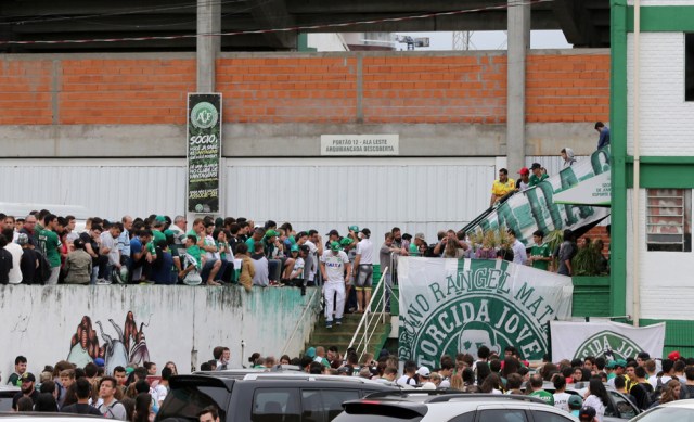 Fans of Chapecoense soccer team are pictured in front of the Arena Conda stadium in Chapeco, Brazil, November 29, 2016. REUTERS/Paulo Whitaker