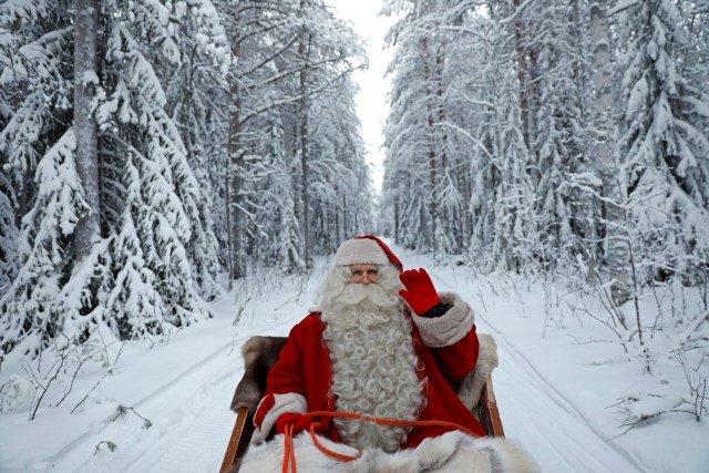 Santa Claus rides in his sleigh as he prepares for Christmas in the Arctic Circle near Rovaniemi, Finland December 15, 2016. REUTERS/Pawel Kopczynski   SEARCH "KOPCZYNSKI SANTA" FOR THIS STORY. SEARCH "THE WIDER IMAGE" FOR ALL STORIES  TPX IMAGES OF THE DAY