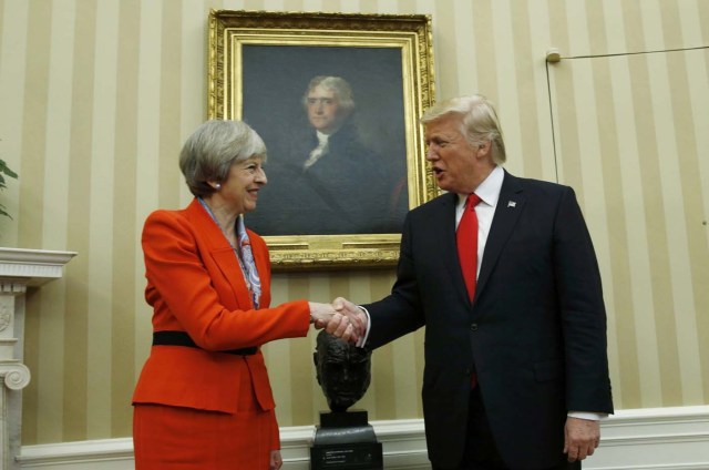 U.S. President Donald Trump meets with British Prime Minister Theresa May in the White House Oval Office in Washington, U.S., January 27, 2017. REUTERS/Kevin Lamarque