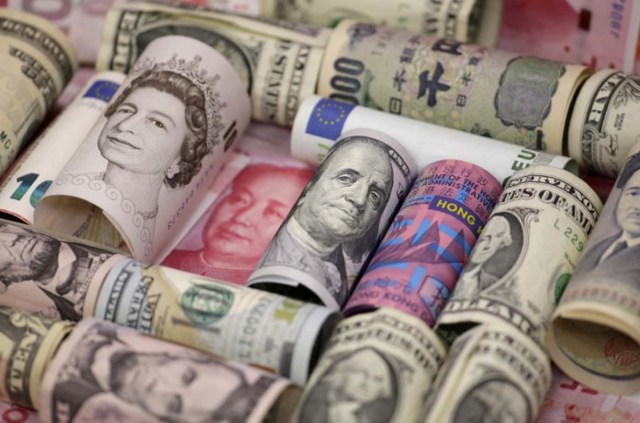 FILE PHOTO: Euro, Hong Kong dollar, U.S. dollar, Japanese yen, British pound and Chinese 100-yuan banknotes are seen in a picture illustration shot January 21, 2016. REUTERS/Jason Lee/Illustration/File Photo