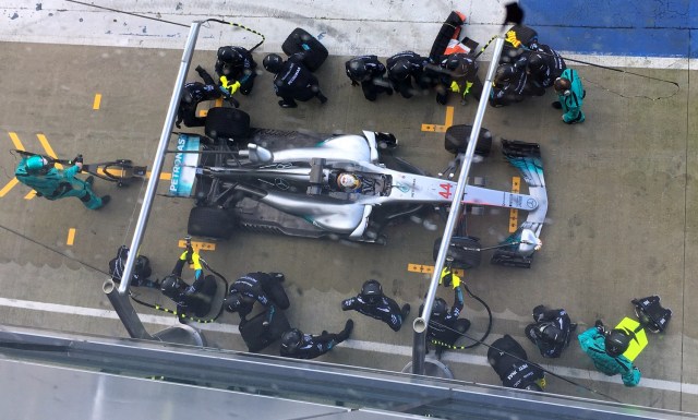 Britain Formula One - F1 - 2017 Mercedes Formula One Car Launch - Silverstone - 23/2/17 Mercedes' Lewis Hamilton practices a pit stop Reuters / Alan Baldwin Livepic EDITORIAL USE ONLY.