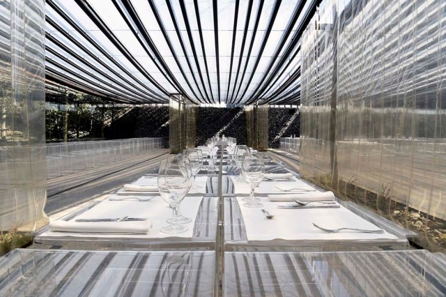 A picture taken in Olot on March 2, 2017 shows a dinning room of the restaurant "les Cols" designed by RCR architects, formed by Spanish architects, Rafael Aranda, Carme Pigem and Ramon Vialta who won yesterday the prestigious Pritzker Prize for modern works. The choice was seen as a move away from the celebrity architects that have dominated the field in favour of the homegrown vision of a trio of professionals who have worked together for 30 years in their hometown of Olot in Catalonia. / AFP PHOTO / LLUIS GENE