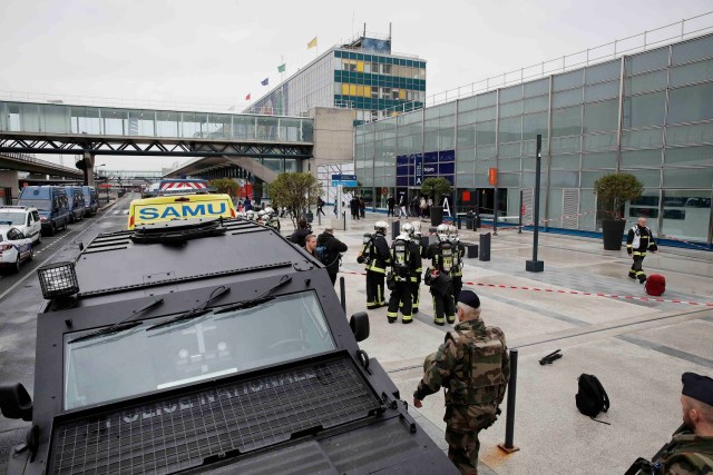 Military and emergency services outside Orly airport southern terminal after a shooting incident near Paris, France March 18, 2017. REUTERS/Benoit Tessier