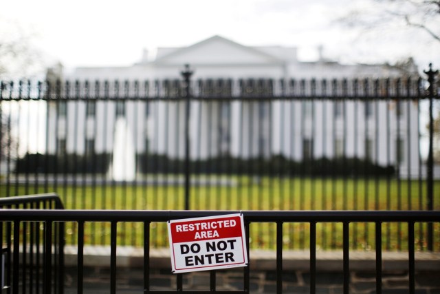 FILE PHOTO: A restricted area sign is seen outside of the White House in Washington November 27, 2015. REUTERS/Carlos Barria/File Photo