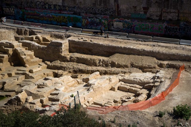 A picture taken on July 28, 2017 in Marseille, southern France, shows the area of a Ancient Greek quarry set to be classified as a historical monument after the mobilization of local residents. / AFP PHOTO / BERTRAND LANGLOIS