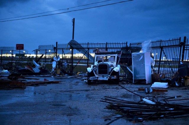 Damage is seen in the aftermath of Hurricane Harvey August 26, 2017 in Katy, Texas. Hurricane Harvey stalled over central Texas on Saturday, August 26, 2017, raising fears of "catastrophic" flooding after the megastorm -- the most powerful to hit the United States since 2005 -- left a deadly trail of devastation along the Gulf Coast. The latest forecasts show that Harvey, now downgraded to tropical storm status, will hover along the shore for the next four or five days, dumping massive amounts of rain. / AFP PHOTO / Brendan Smialowski