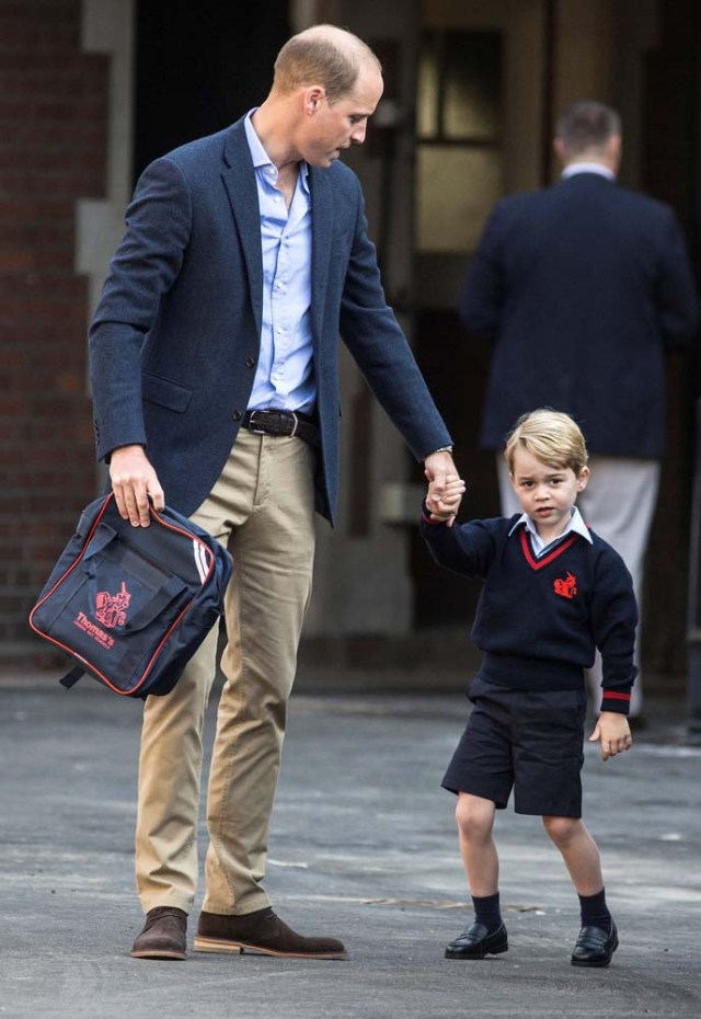 Britain's Prince William accompanies his son Prince George on his first day of school at Thomas's school in Battersea, London, September 7, 2017. REUTERS/Richard Pohle/Pool