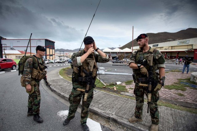 Dutch soldiers patrol the streets of Sint Maarten Dutch part of Saint Martin island in the Carribean after the Hurricane Irma September 7, 2017. Picture taken September 7, 2017. Netherlands Ministry of Defence- Gerben van Es/Handout via REUTERS ATTENTION EDITORS - THIS IMAGE HAS BEEN SUPPLIED BY A THIRD PARTY. MANDATORY CREDIT.NO RESALES. NO ARCHIVES