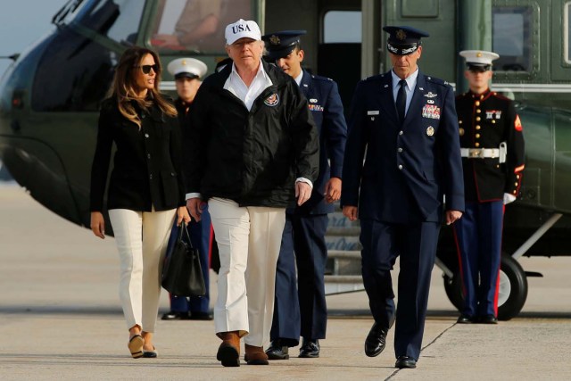 U.S. President Donald Trump and First Lady Melania Trump (L) board Air Force One for travel to view Hurricane Irma response efforts in Florida, from Joint Base Andrews, Maryland, U.S. September 14, 2017. REUTERS/Jonathan Ernst