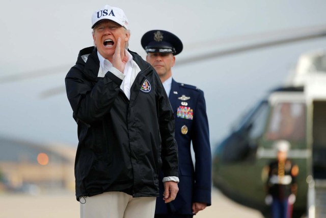 U.S. President Donald Trump answers a reporter's question as he boards Air Force One for travel to view Hurricane Irma response efforts in Florida, from Joint Base Andrews, Maryland, U.S., September 14, 2017. REUTERS/Jonathan Ernst