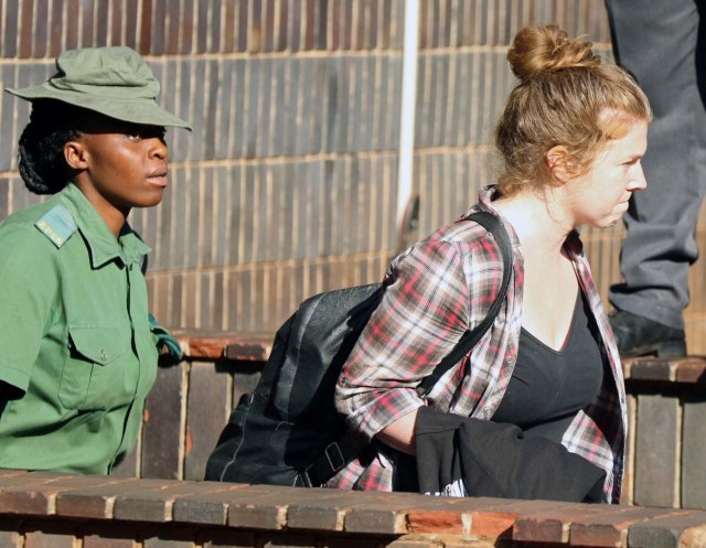 U.S. citizen Martha O'Donovan is led into a remand truck outside court in Harare, Zimbabwe November 4, 2017. REUTERS/Philimon Bulawayo