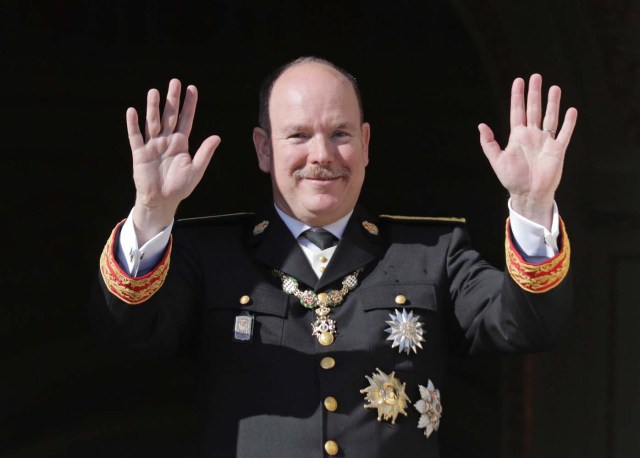 Prince Albert II of Monaco waves from the Palace Balcony during the celebrations marking Monaco's National Day, November 19, 2017. REUTERS/Eric Gaillard