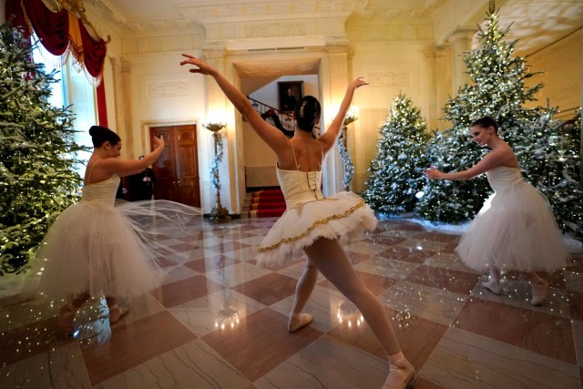 Ballerinas perform before U.S. First Lady Melania Trump (not pictured) begins a tour of the holiday decorations with reporters at the White House in Washington, U.S. November 27, 2017.  REUTERS/Jonathan Ernst