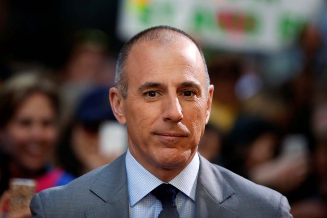 FILE PHOTO: Host Matt Lauer pauses during a break while filming NBC's "Today" show at Rockefeller Center in New York, U.S., May 3, 2013. REUTERS/Lucas Jackson/File Photo