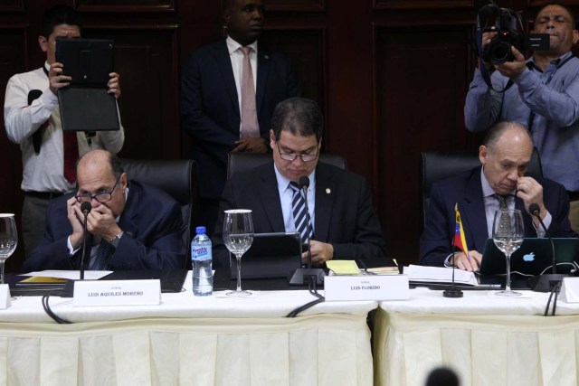Members of Venezuela's opposition Luis Aquiles Moreno, Luis Florido and Gustavo Velazquez attend a meeting between Venezuela's government and opposition coalition in Santo Domingo, Dominican Republic, December 2, 2017. REUTERS/Ricardo Rojas