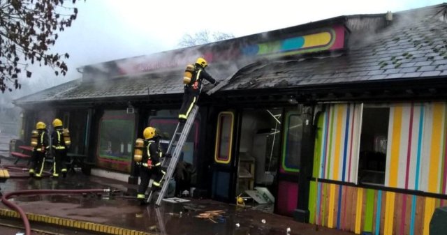 Firefighters are seen tackling a blaze at London Zoo following a fire which broke out at a shop and cafe at the attraction, in this photograph received from London Fire Brigade, in central London, Britain December 23, 2017. London Fire Brigade/Handout via REUTERS THIS IMAGE HAS BEEN SUPPLIED BY A THIRD PARTY. MANDATORY CREDIT. NO RESALES. NO ARCHIVES.