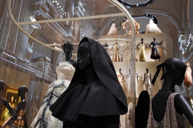 (FILES) This file picture taken on July 3, 2017 shows dresses exhibited during the Dior exhibition that celebrates the seventieth anniversary of the Christian Dior fashion house at the Museum of Decorative Arts (Musee des Arts Decoratifs) in Paris. 708 000 people visited the exhibition dedicated to Christian Dior from July 5, 2017 to January 7, 2018 in Paris. / AFP PHOTO / ALAIN JOCARD