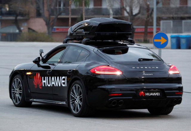 A driverless car controlled by a Huawei Mate 10 Pro mobile is pictured during the Mobile World Congress in Barcelona, Spain February 26, 2018. REUTERS/Yves Herman