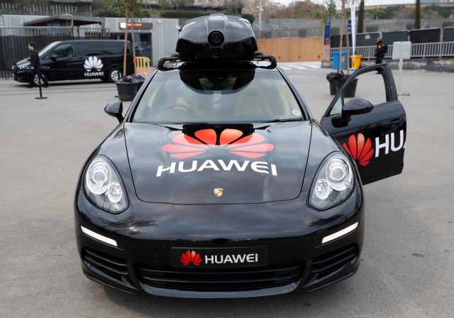 A driverless car controlled by a Huawei Mate 10 Pro mobile is pictured during the Mobile World Congress in Barcelona, Spain February 26, 2018. REUTERS/Yves Herman