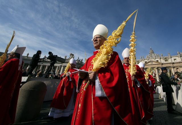 Cardinals arrive to attend the Palm Sunday Mass in Saint Peter's Square at the Vatican, March 25, 2018  REUTERS/Tony Gentile