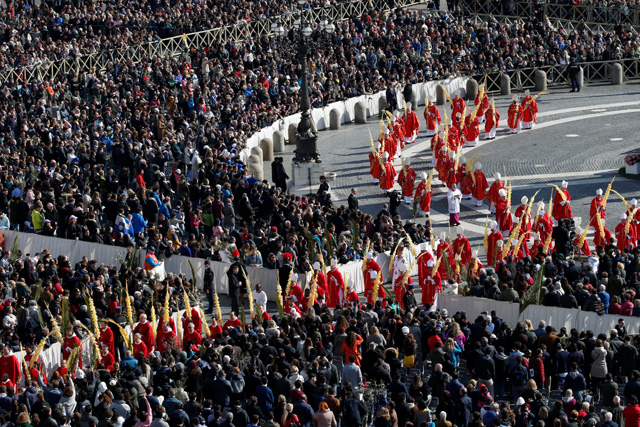 Cardinals arrive to attend the Palm Sunday Mass in Saint Peter's Square at the Vatican, March 25, 2018   REUTERS/Stefano Rellandini