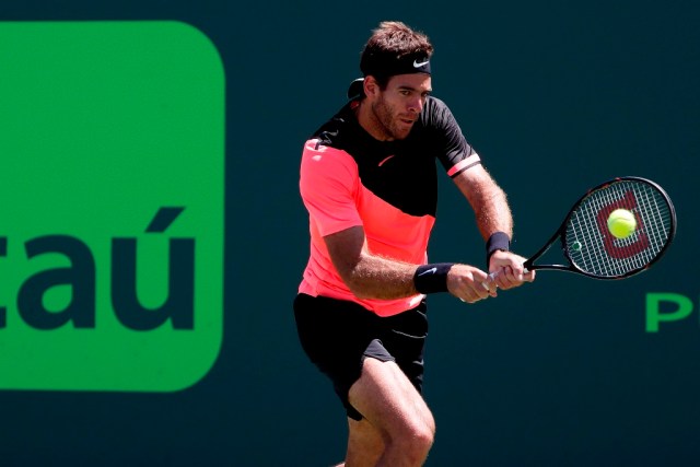 Mar 30, 2018; Key Biscayne, FL, USA; Juan Martin del Potro of Argentina hits a backhand against John Isner of the United States (not pictured) in a men's singles semi-final of the Miami Open at Tennis Center at Crandon Park. Isner won 6-1, 7-6(2). Mandatory Credit: Geoff Burke-USA TODAY Sports
