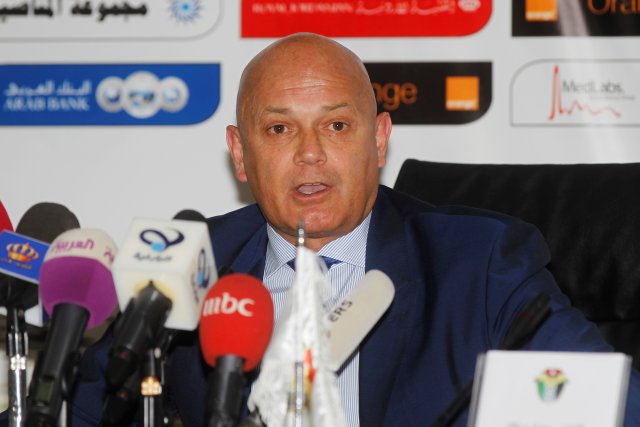 Former England international Ray Wilkins speaks to the media, after he signed his contract as the new head coach of the Jordan national team, in Amman September 17, 2014. The former Manchester United, Chelsea and Queens Park Rangers player was given the job on the recommendation of Prince Ali Bin Al Hussein, who has been head of the Jordanian FA since he was 25. REUTERS/Majed Jaber/File Photo