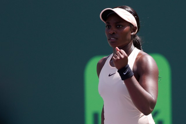 Mar 31, 2018; Key Biscayne, FL, USA; Sloane Stephens of the United States celebrates after winning the first set tie-breaker against Jelena Ostapenko of Latvia (not pictured) during the women's singles final of the Miami Open at Tennis Center at Crandon Park. Mandatory Credit: Geoff Burke-USA TODAY Sports
