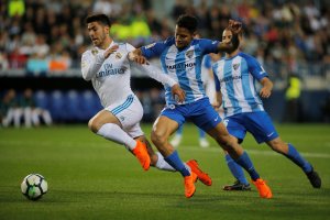 El Real Madrid recupera la tercera plaza tras vencer al Málaga de Roberto Rosales