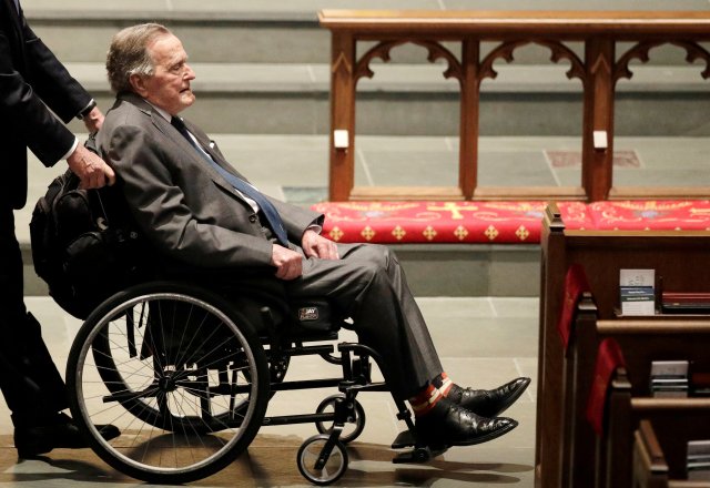 FILE PHOTO: Former President George H.W. Bush, arrives at St. Martin's Episcopal Church for funeral services for former first lady Barbara Bush in Houston, Texas, U.S., April 21, 2018.   David J. Phillip/Pool via Reuters/File Photo