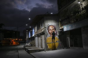 AP PHOTOS: Venezuelan street artist seeks to inspire